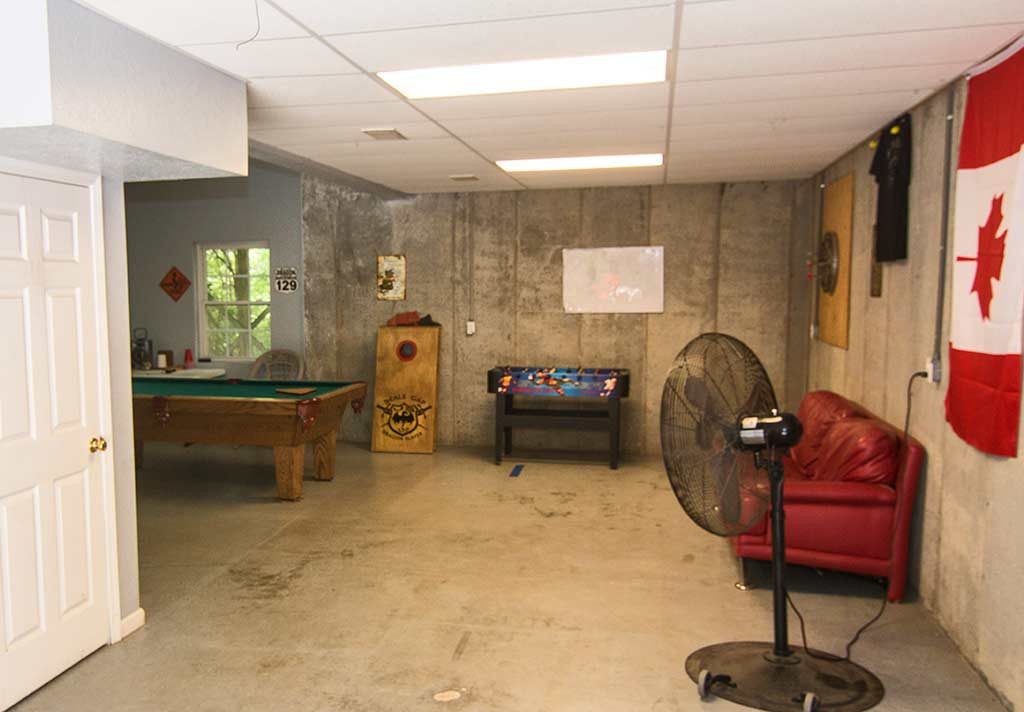 Drive In garage with game room